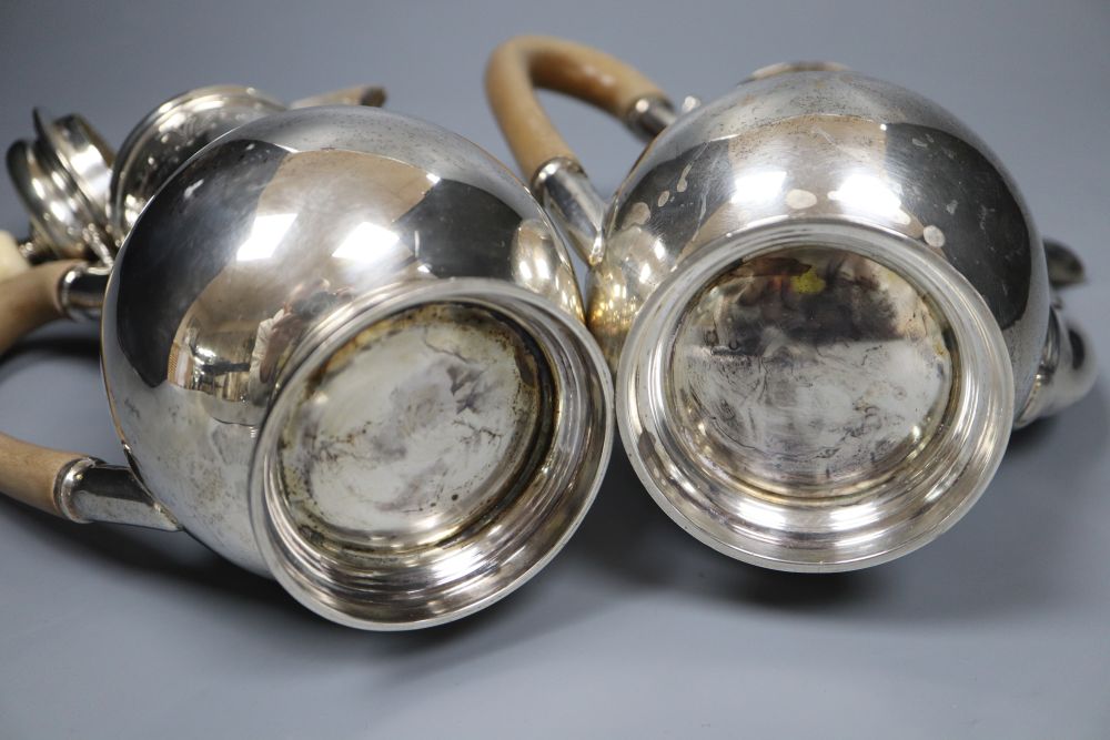 A George V silver cafe au lait pair by S.J. Phillips Ltd, London 1913, 20.5cm, gross 33oz.